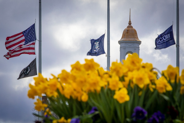  photo of Wilbur Cross with the flags on the Great Lawn